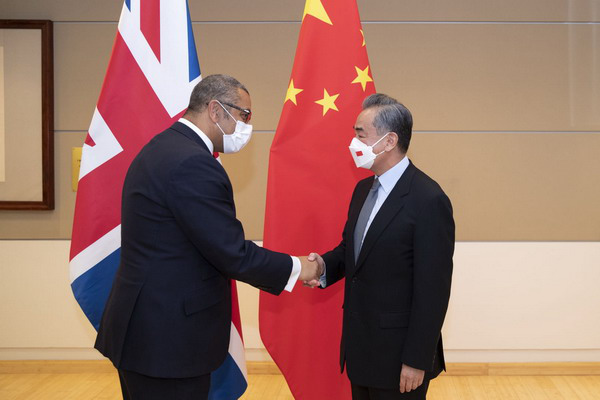 Wang yi meets with british secretary of state for foreign and commonwealth affairs james cleverly